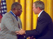 President George W. Bush presents the Presidential Medal of Freedom to Hank Aaron
